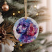a purple poodle ornament hanging from a christmas tree