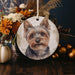 a ceramic ornament with a picture of a dog on it