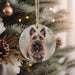 a dog ornament hanging on a christmas tree