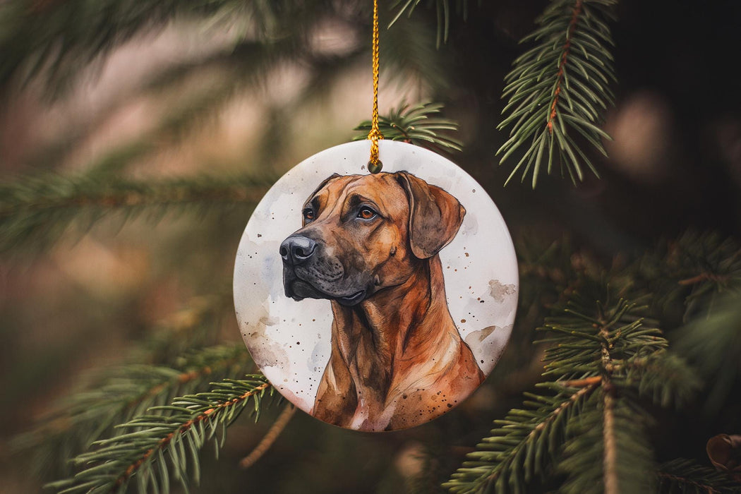 a dog ornament hanging from a christmas tree