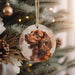a christmas ornament with a picture of a dog on it