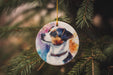 a dog ornament hanging from a christmas tree
