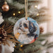 a dog ornament hanging from a christmas tree