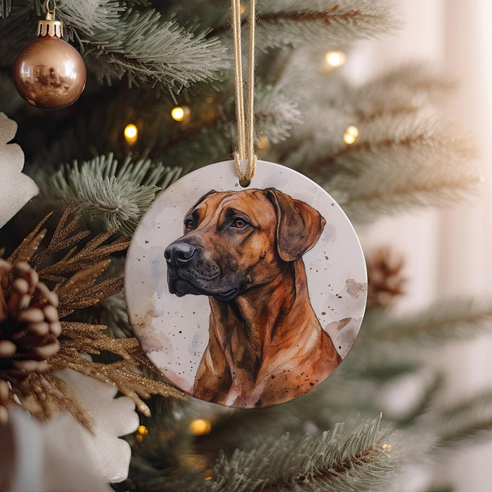 a brown dog ornament hanging from a christmas tree