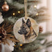 a german shepherd ornament hanging on a christmas tree
