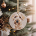 a dog ornament hanging from a christmas tree