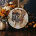 a ceramic ornament with a picture of a dog on it
