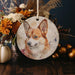 a ceramic ornament with a picture of a dog on it