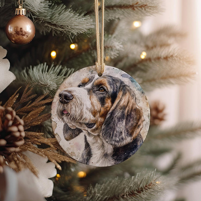 a dog ornament hanging from a christmas tree