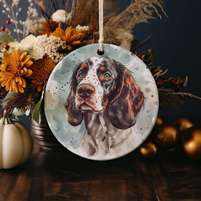 a ceramic ornament with a picture of a dog on it