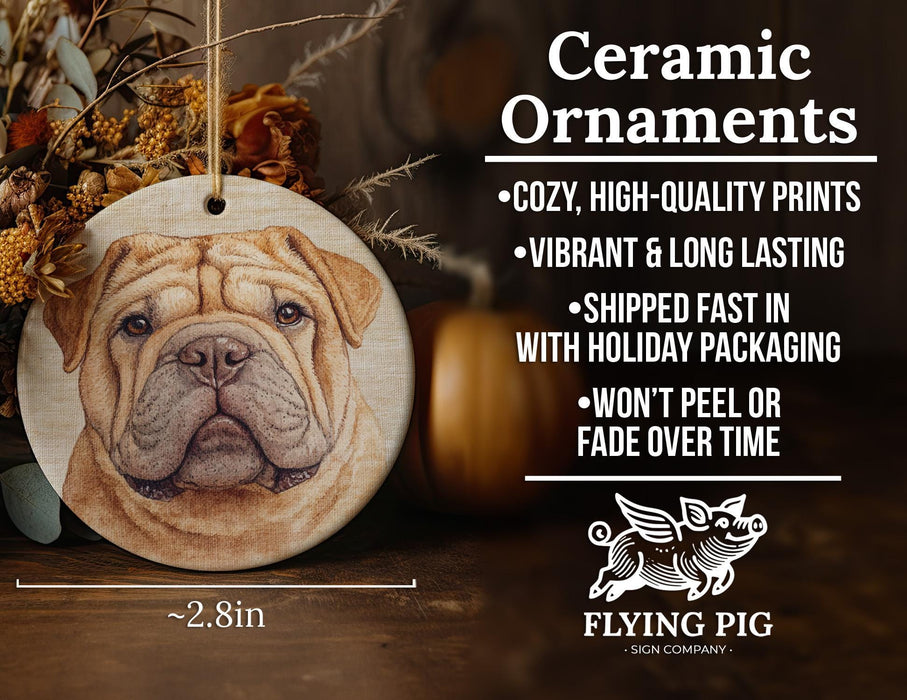 a ceramic ornament with a dog's face on it