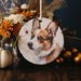 a ceramic ornament with a picture of a dog on it
