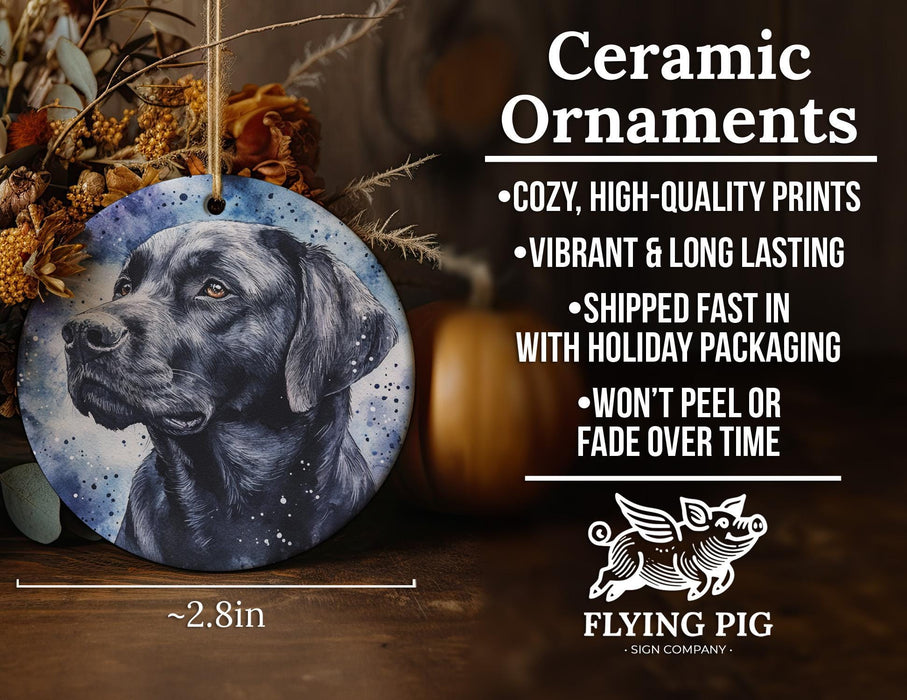 a ceramic ornament with a black dog on it