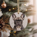 a dog ornament hanging from a christmas tree