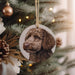 a dog ornament hanging from a christmas tree