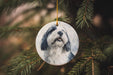 a ceramic ornament with a picture of a dog on it