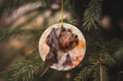 a dog ornament hanging from a christmas tree