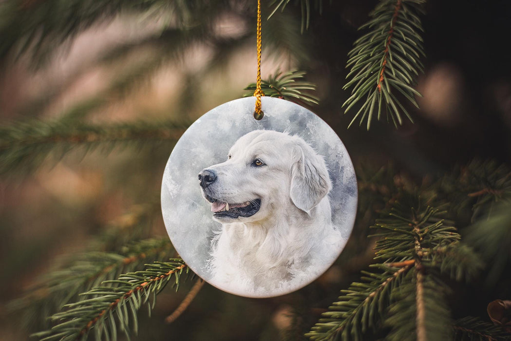 a white dog ornament hanging from a christmas tree