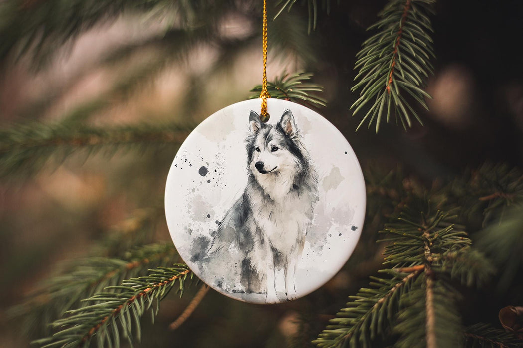 a ceramic ornament with a picture of a wolf on it