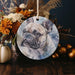 a ceramic ornament with a picture of a dog on it