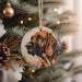 a dog ornament hanging from a christmas tree