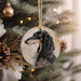 a black and white dog ornament hanging from a christmas tree