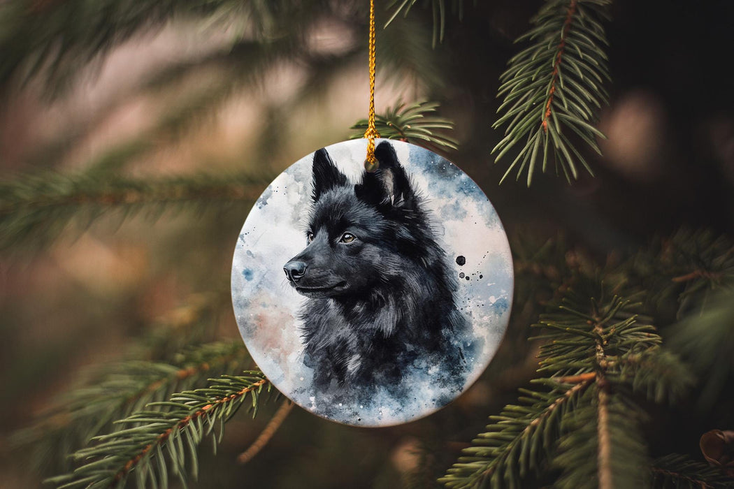a black dog ornament hanging from a christmas tree