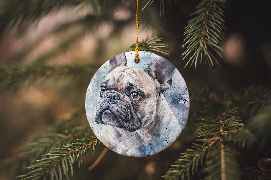 a ceramic ornament hanging from a christmas tree
