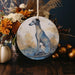 a ceramic ornament with a dog on it