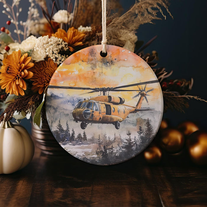 a picture of a helicopter on a round ornament