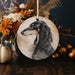 a ceramic ornament with a dog on it