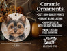 a ceramic ornament with a picture of a dog on it