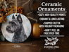 a ceramic ornament with a picture of a dog