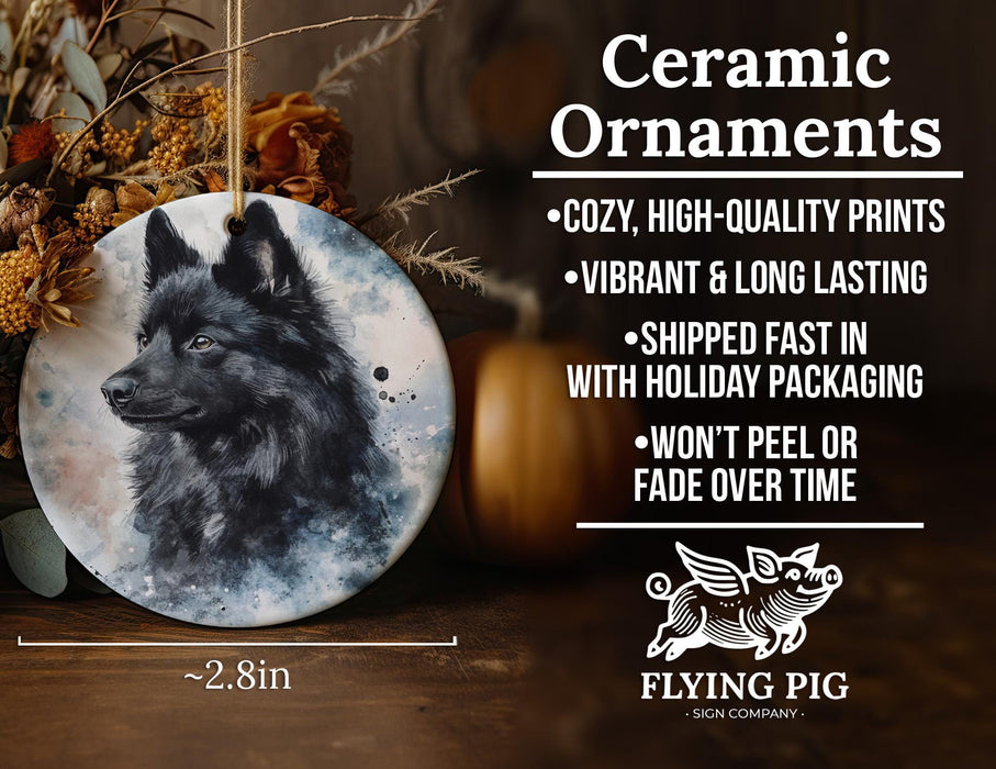 a ceramic ornament with a black dog on it