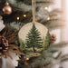 a christmas ornament hanging from a christmas tree