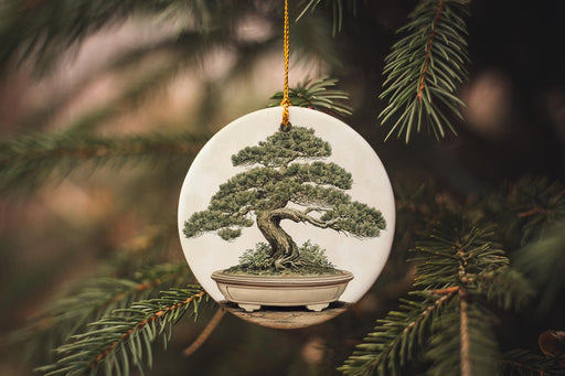 a ceramic ornament with a bonsai tree on it