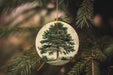a christmas ornament hanging from a christmas tree