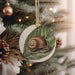 a close up of a christmas ornament on a tree
