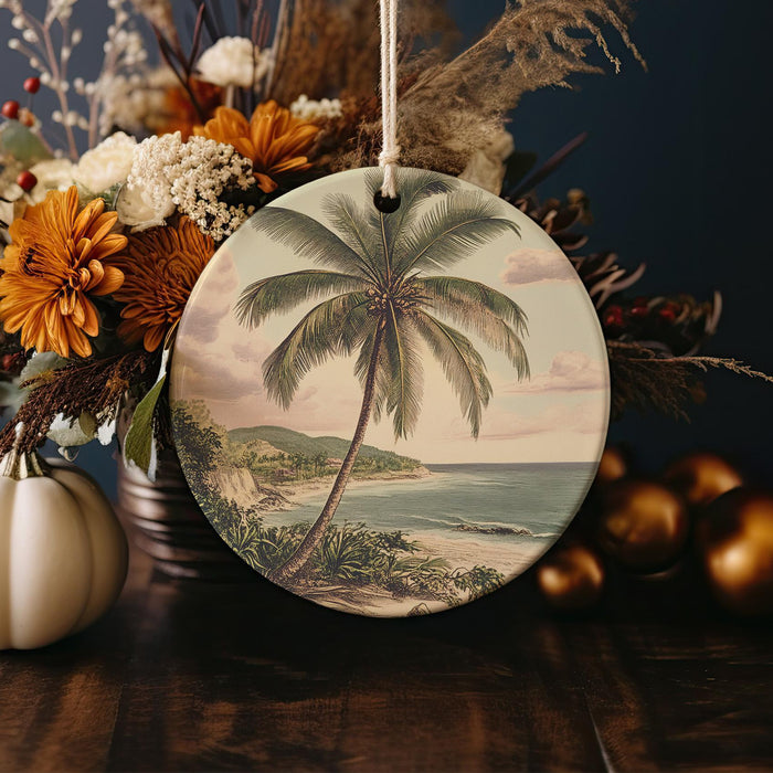 a ceramic ornament with a palm tree on it