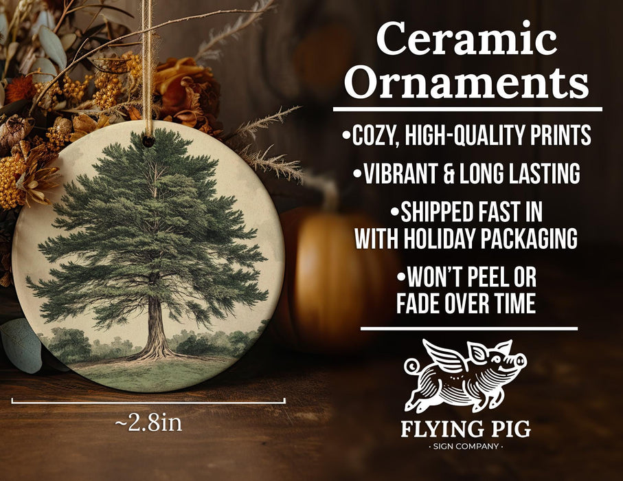 a ceramic ornament with a picture of a tree on it