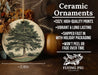 a ceramic ornament with a picture of a tree on it