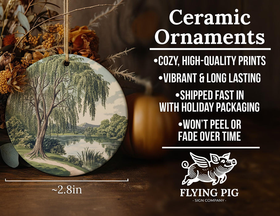 a ceramic ornament with a picture of a tree