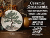 a ceramic ornament with a tree on it