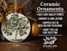 a ceramic ornament with a tree on it