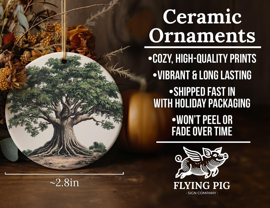 a ceramic ornament with a tree on it