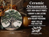 a ceramic ornament with a tree on it