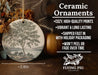 a ceramic ornament with a tree on it