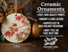 a ceramic ornament with autumn leaves on it