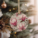 a christmas ornament hanging from a christmas tree