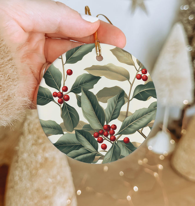 a person holding a christmas ornament in their hand